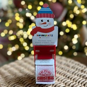 Novogratz do not open until Christmas tape packing Holiday seal